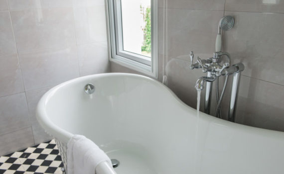 luxurious-tub-modern-bathroom-side-windows-view-bright-sunlight-sunny-day_44277-35